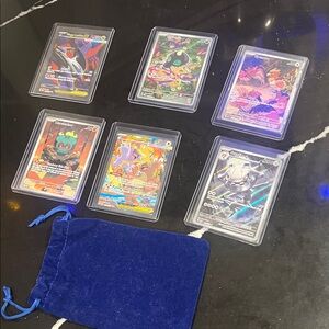 Set of 6 Collectible Pokémon Trading Cards with Blue Velvet Pouch